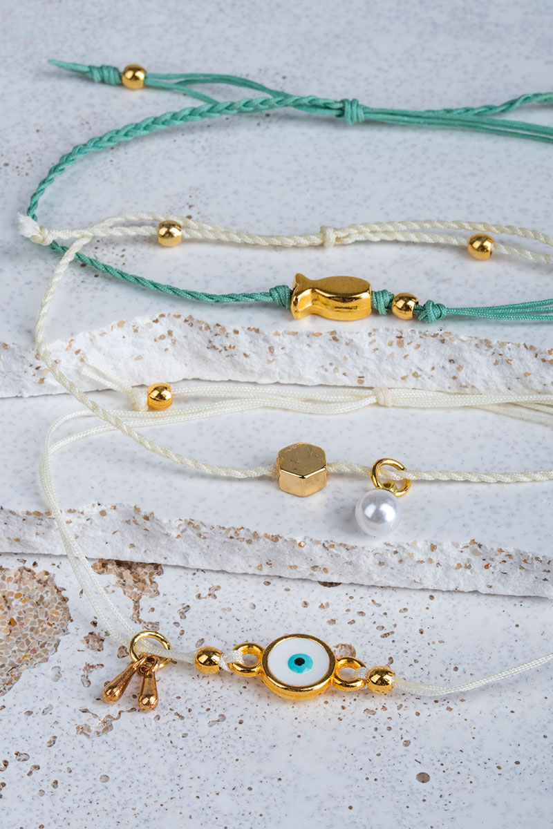 Friendship bracelets in white and green